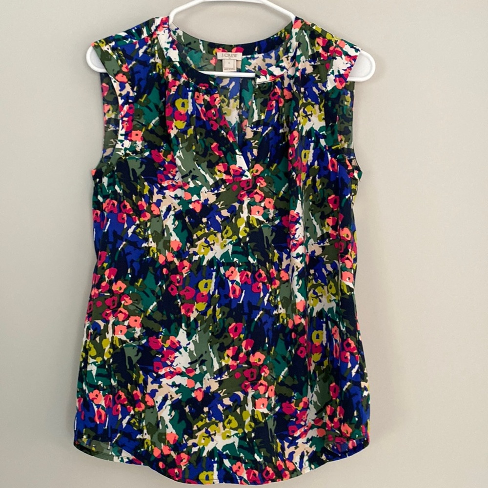 Floral J Crew sleeveless blouse.